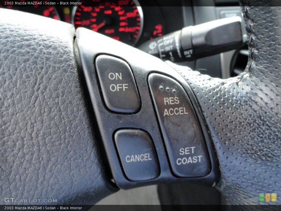Black Interior Controls for the 2003 Mazda MAZDA6 i Sedan #51471354