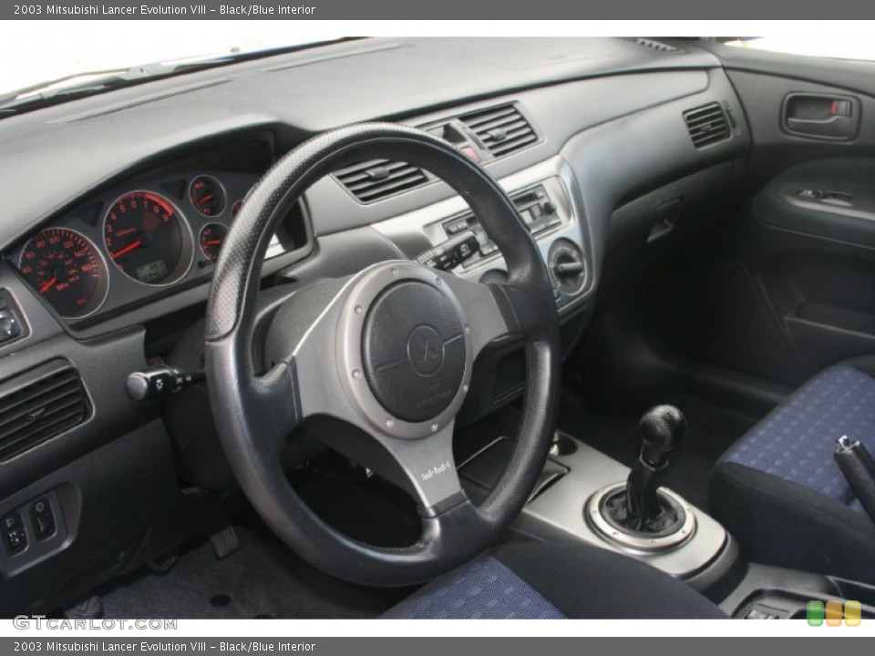 Black/Blue Interior Dashboard for the 2003 Mitsubishi Lancer Evolution VIII #51476718