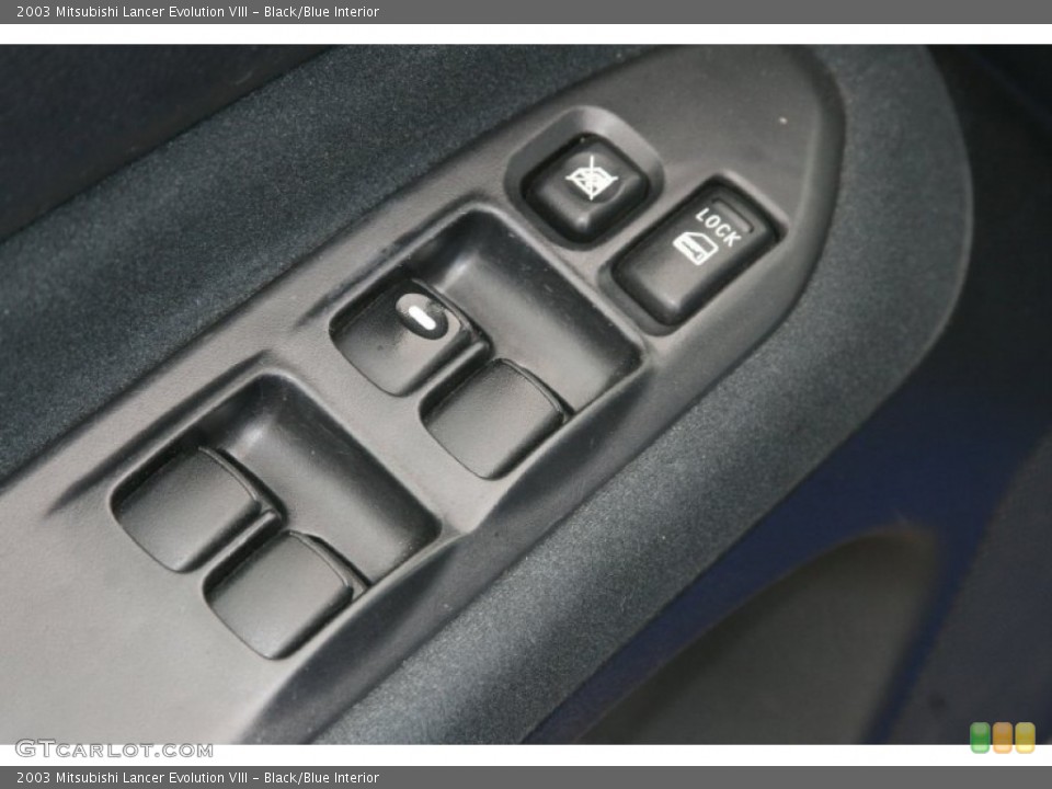 Black/Blue Interior Controls for the 2003 Mitsubishi Lancer Evolution VIII #51476727