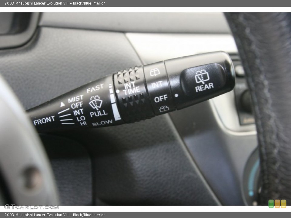 Black/Blue Interior Controls for the 2003 Mitsubishi Lancer Evolution VIII #51476775