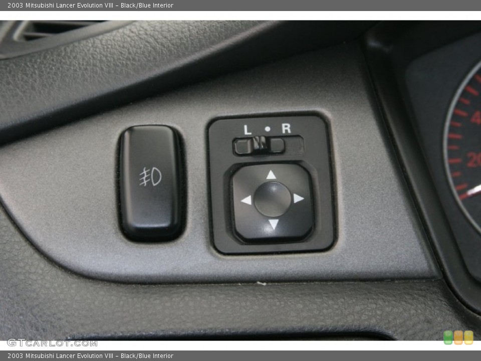 Black/Blue Interior Controls for the 2003 Mitsubishi Lancer Evolution VIII #51476781
