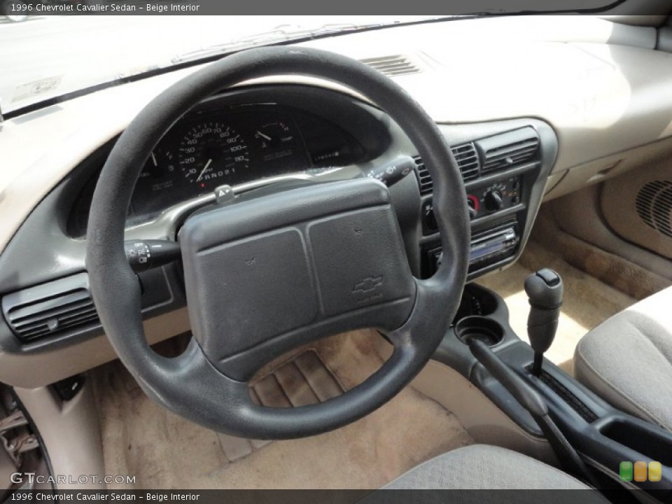 Beige Interior Steering Wheel for the 1996 Chevrolet Cavalier Sedan #51487276