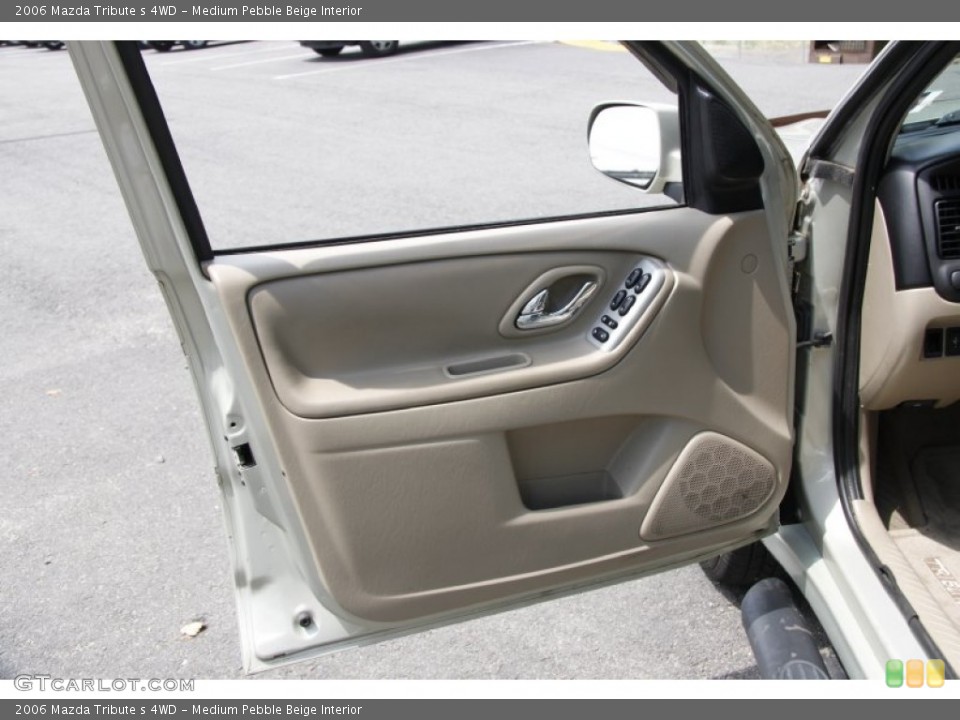 Medium Pebble Beige Interior Door Panel for the 2006 Mazda Tribute s 4WD #51494599