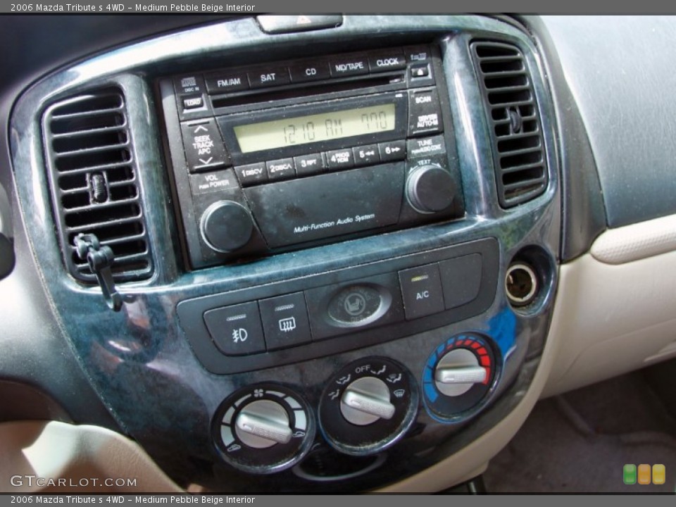 Medium Pebble Beige Interior Controls for the 2006 Mazda Tribute s 4WD #51494707