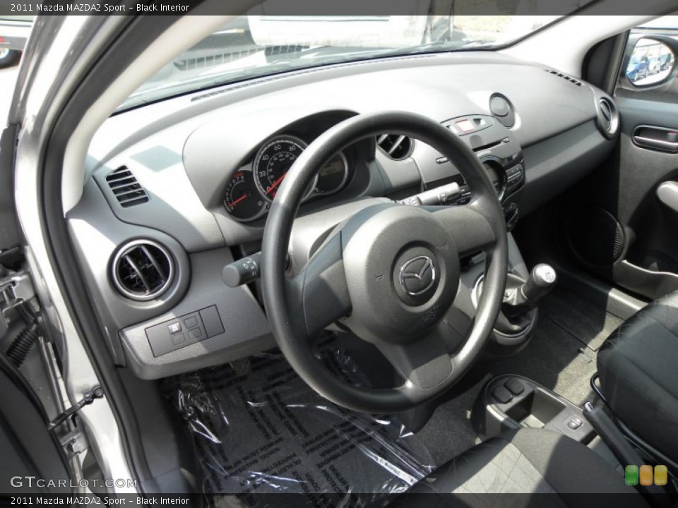 Black Interior Photo for the 2011 Mazda MAZDA2 Sport #51579088