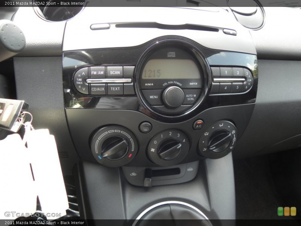 Black Interior Controls for the 2011 Mazda MAZDA2 Sport #51579355