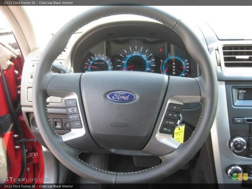 Charcoal Black Interior Steering Wheel for the 2012 Ford Fusion SE #51586546