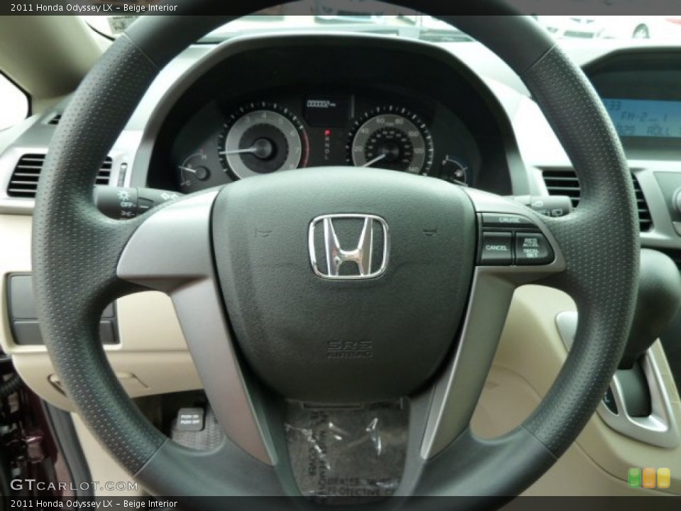 Beige Interior Steering Wheel for the 2011 Honda Odyssey LX #51616429