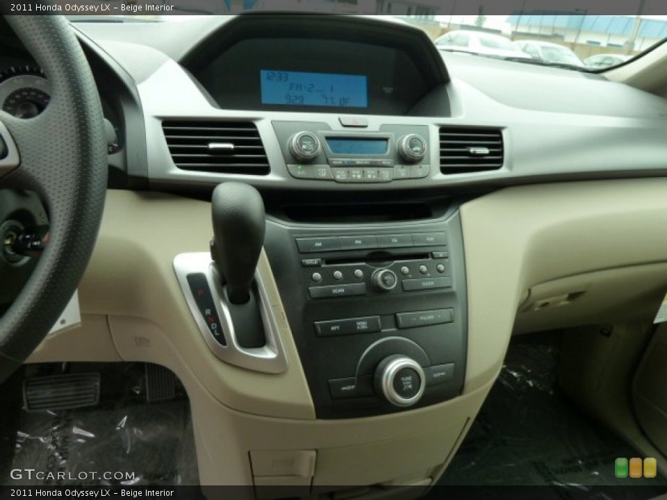 Beige Interior Controls for the 2011 Honda Odyssey LX #51616459