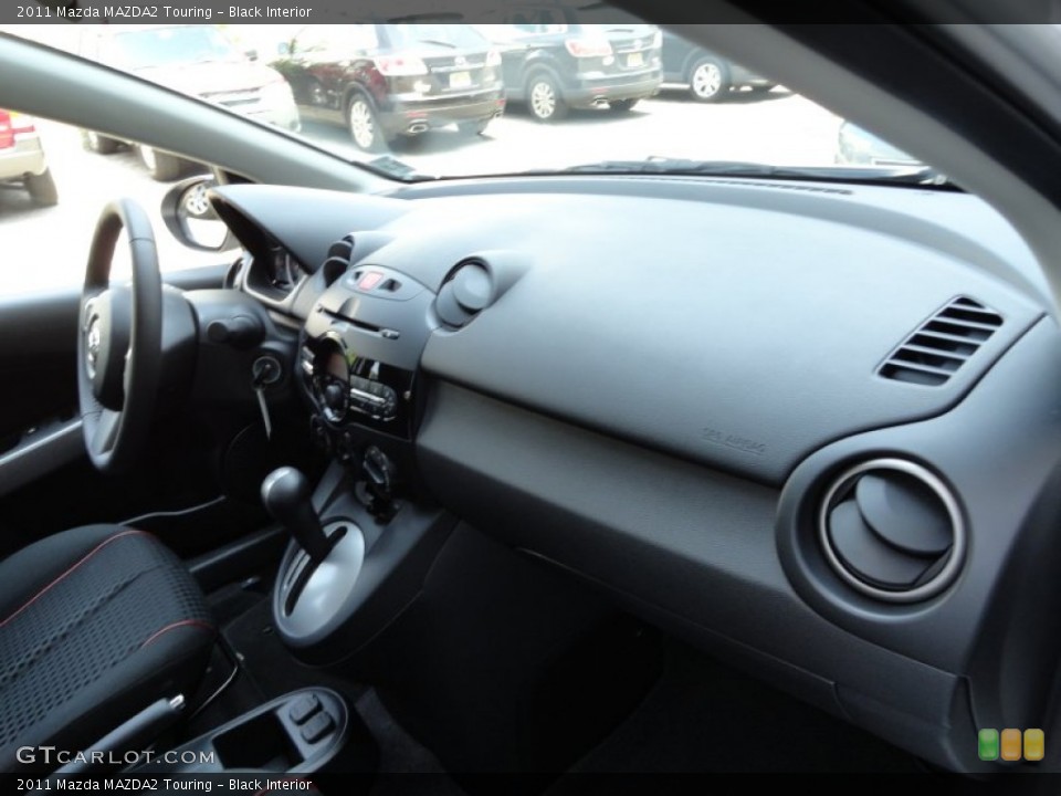 Black Interior Dashboard for the 2011 Mazda MAZDA2 Touring #51654301