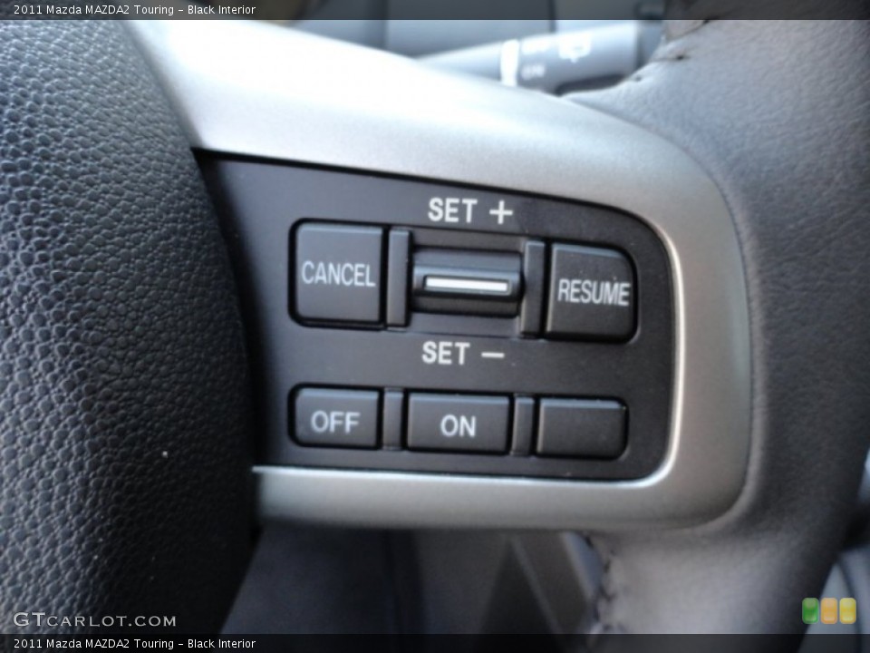 Black Interior Controls for the 2011 Mazda MAZDA2 Touring #51654502