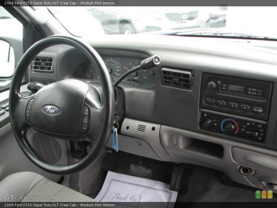 Medium Flint Interior Dashboard for the 2004 Ford F250 Super Duty XLT Crew Cab #51655210