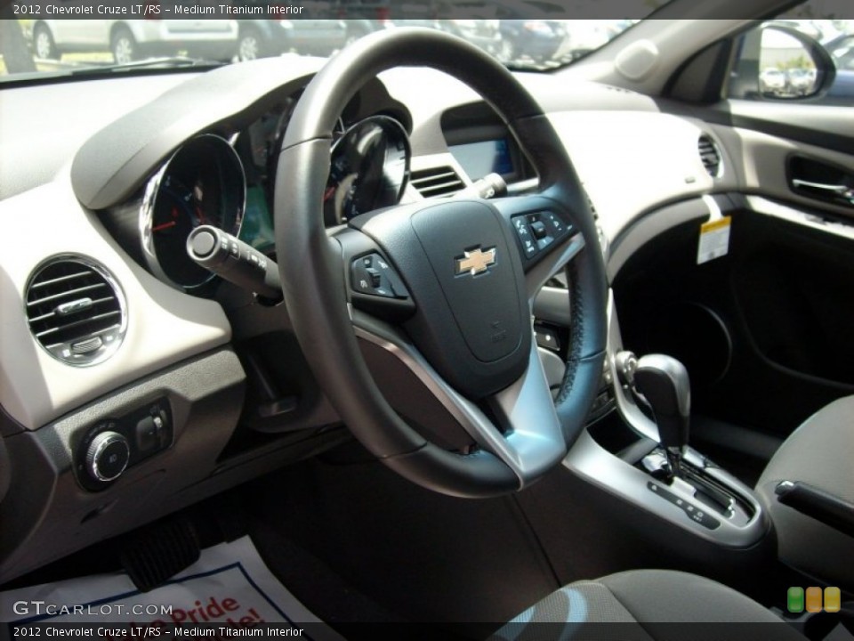 Medium Titanium Interior Steering Wheel for the 2012 Chevrolet Cruze LT/RS #51674241
