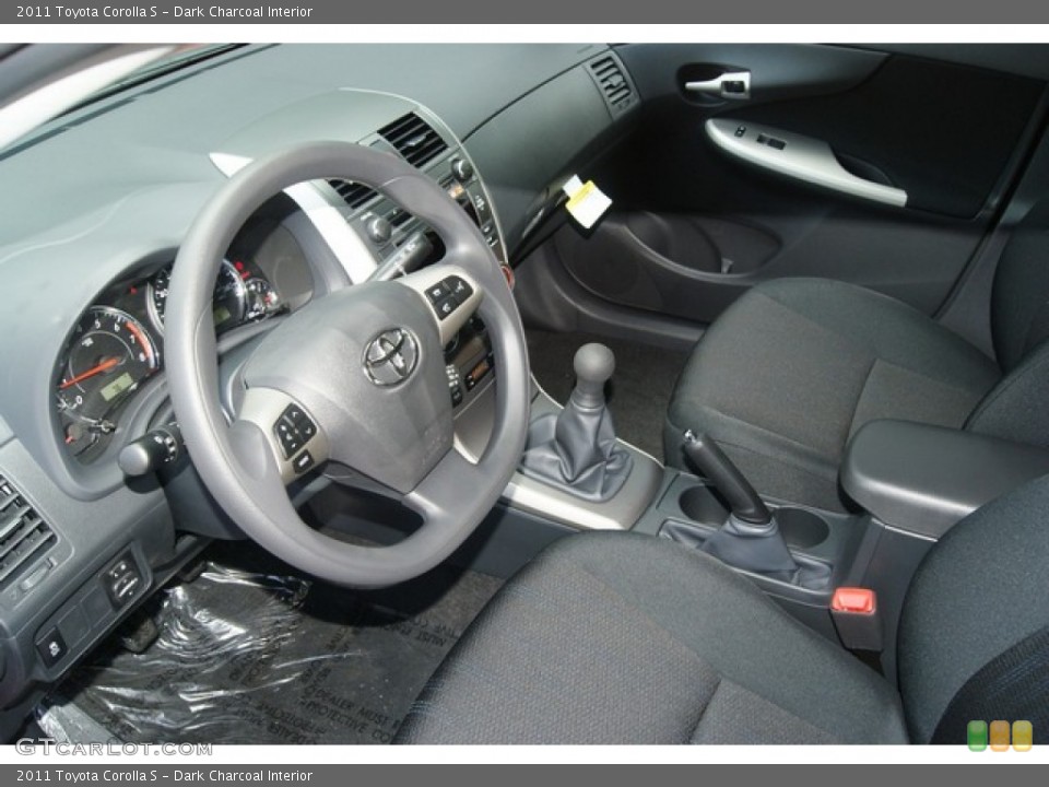 Dark Charcoal Interior Dashboard for the 2011 Toyota Corolla S #51680118