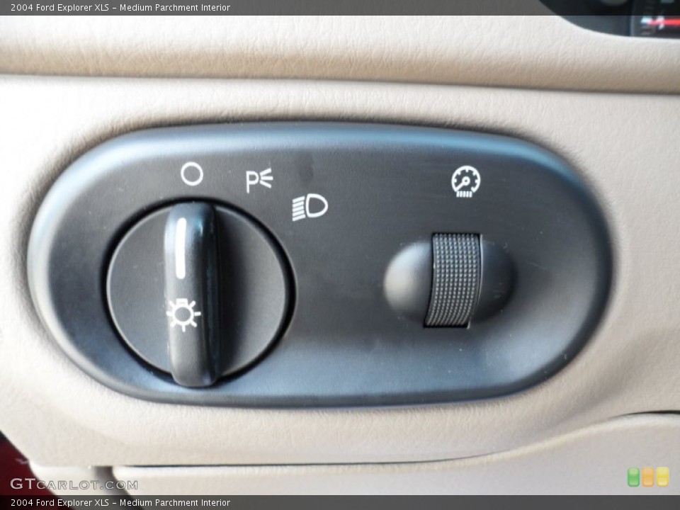 Medium Parchment Interior Controls for the 2004 Ford Explorer XLS #51693385