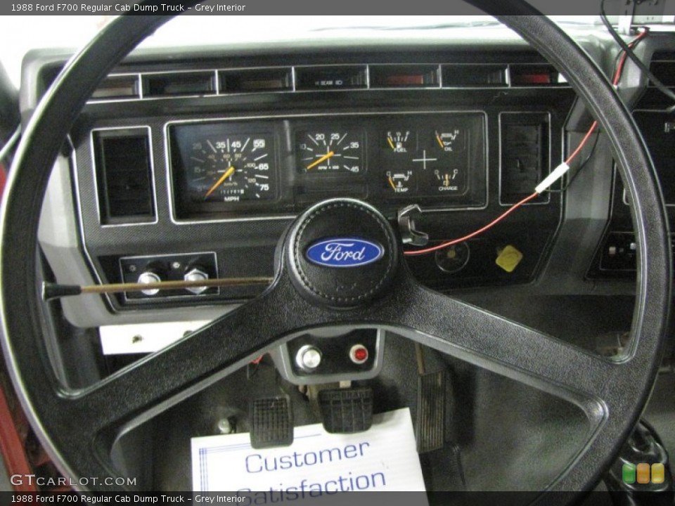 Grey Interior Steering Wheel for the 1988 Ford F700 Regular Cab Dump Truck #51696406