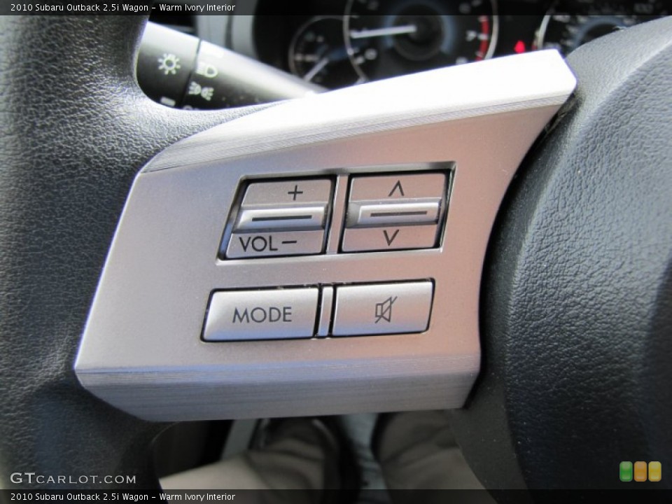 Warm Ivory Interior Controls for the 2010 Subaru Outback 2.5i Wagon #51706036