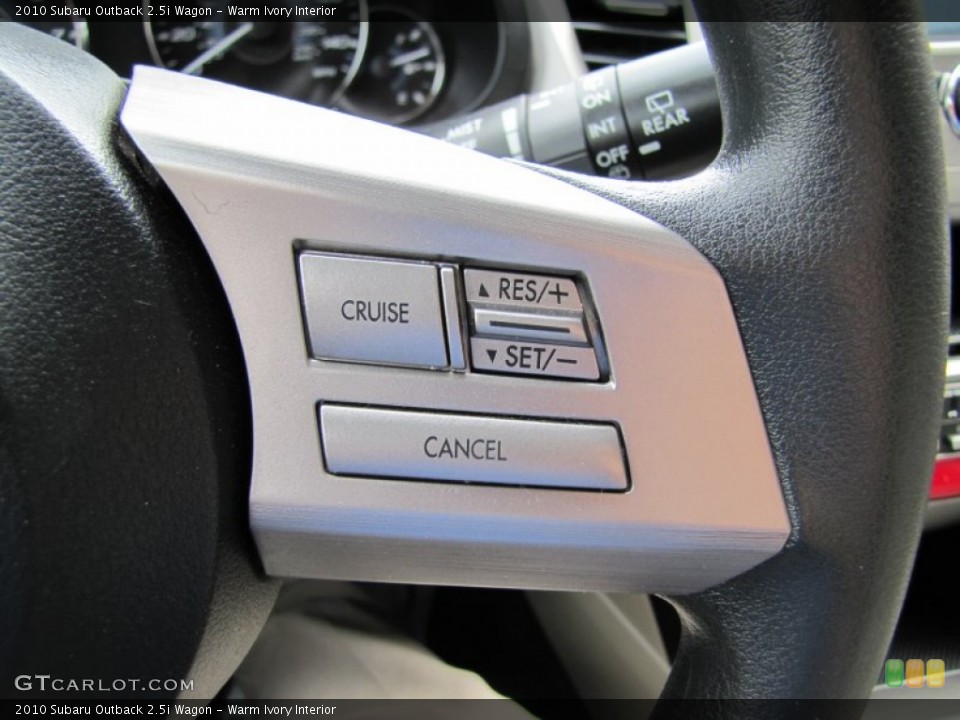 Warm Ivory Interior Controls for the 2010 Subaru Outback 2.5i Wagon #51706063