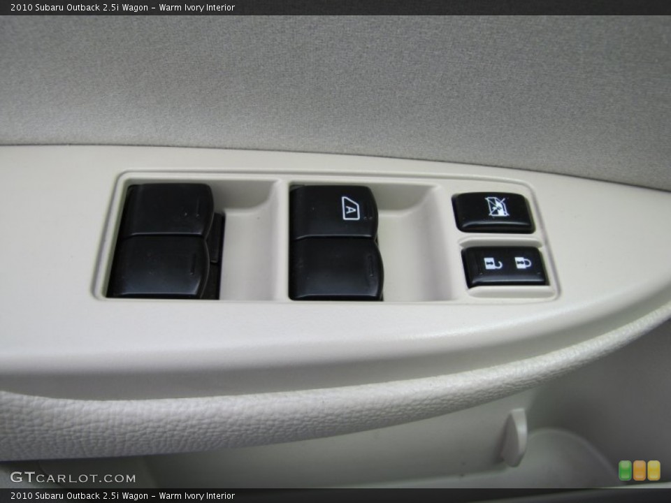 Warm Ivory Interior Controls for the 2010 Subaru Outback 2.5i Wagon #51706075
