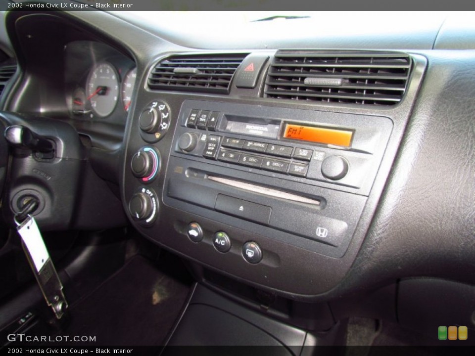 Black Interior Controls for the 2002 Honda Civic LX Coupe #51716404