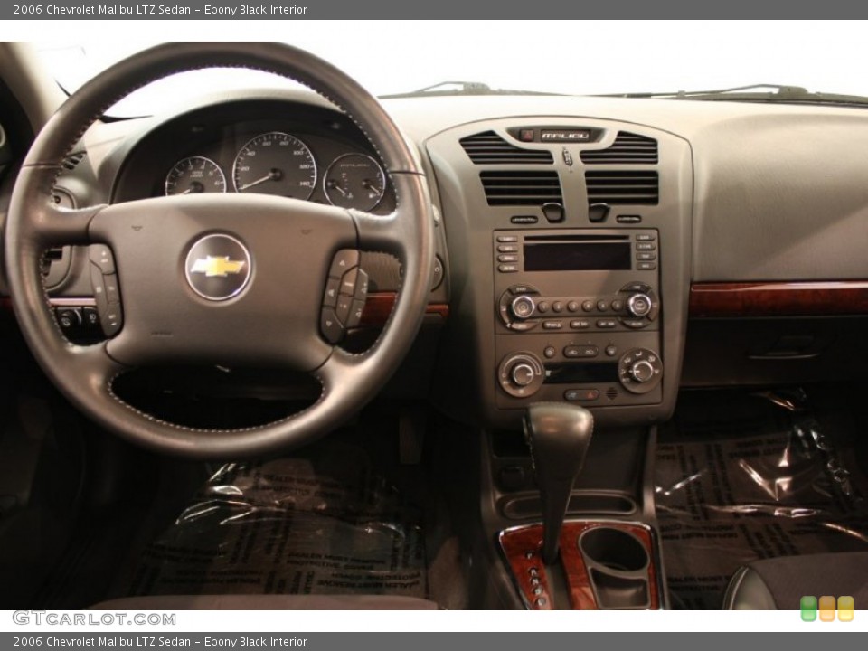 Ebony Black Interior Dashboard for the 2006 Chevrolet Malibu LTZ Sedan #51717574