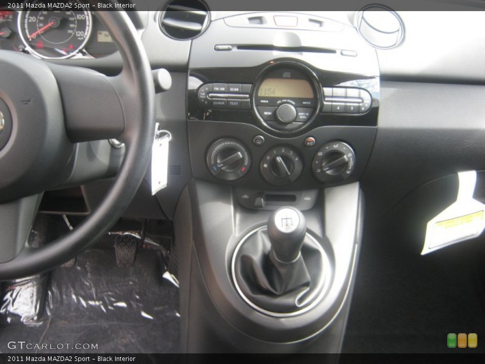Black Interior Controls for the 2011 Mazda MAZDA2 Sport #51719764
