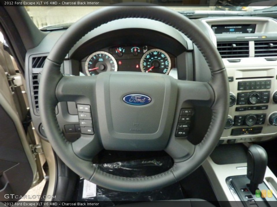 Charcoal Black Interior Steering Wheel for the 2012 Ford Escape XLT V6 4WD #51738390