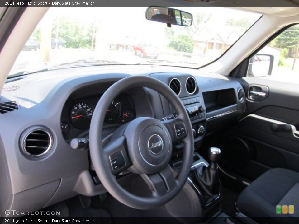 Dark Slate Gray Interior Dashboard for the 2011 Jeep Patriot Sport #51762715