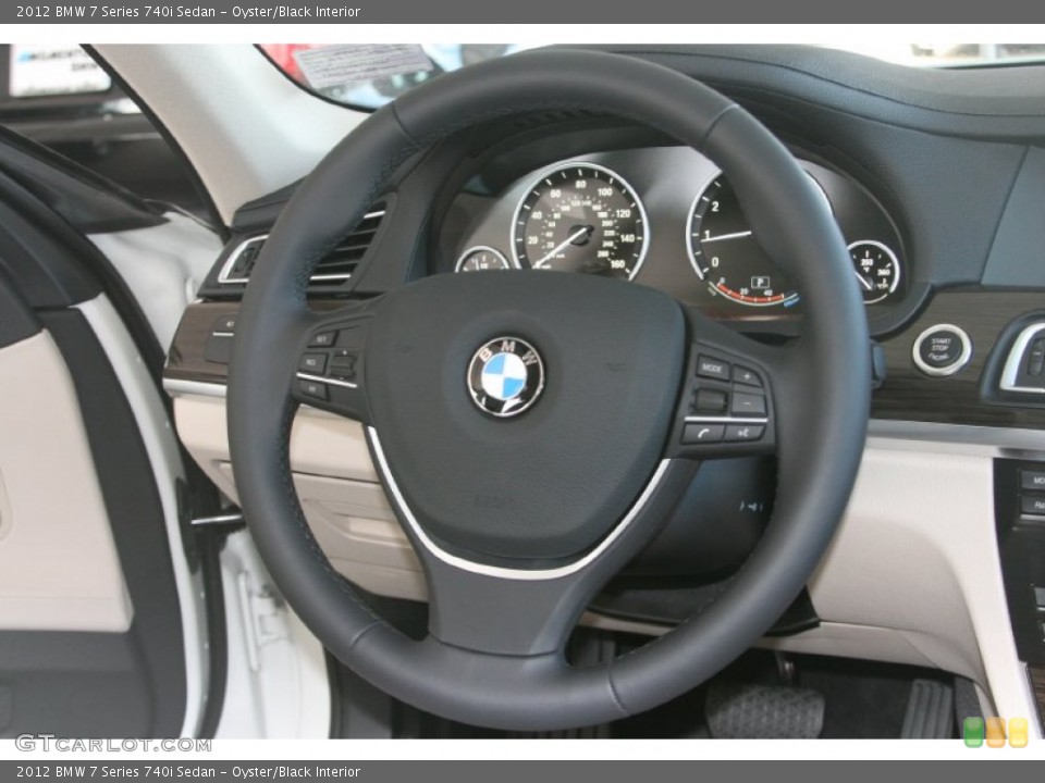 Oyster/Black Interior Steering Wheel for the 2012 BMW 7 Series 740i Sedan #51767773
