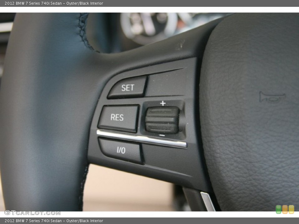 Oyster/Black Interior Controls for the 2012 BMW 7 Series 740i Sedan #51768111