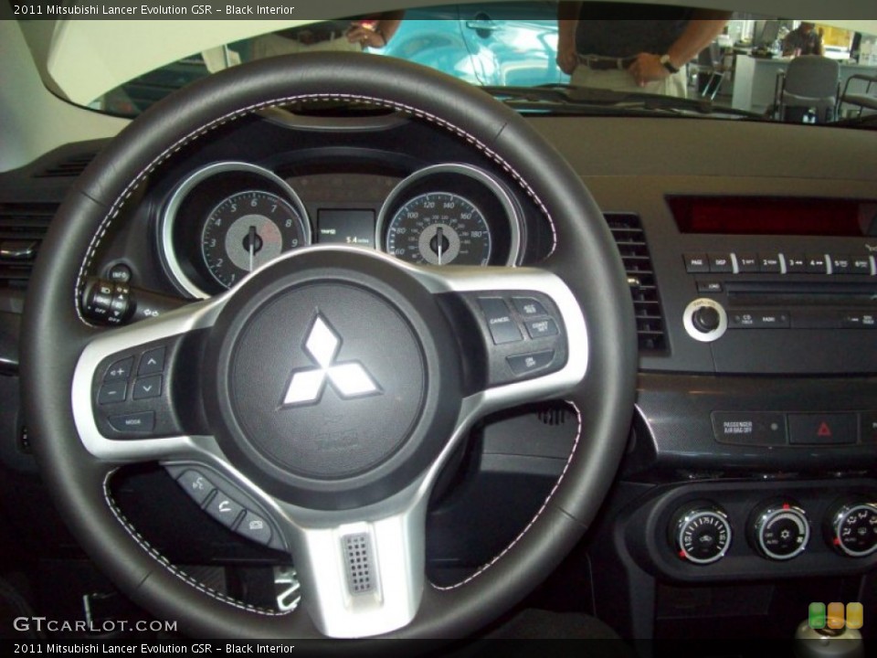 Black Interior Steering Wheel for the 2011 Mitsubishi Lancer Evolution GSR #51771961