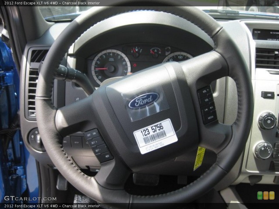 Charcoal Black Interior Steering Wheel for the 2012 Ford Escape XLT V6 4WD #51781484