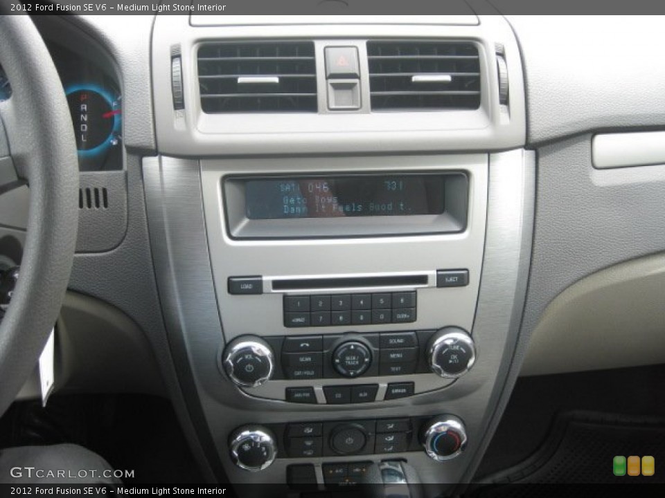 Medium Light Stone Interior Controls for the 2012 Ford Fusion SE V6 #51781595