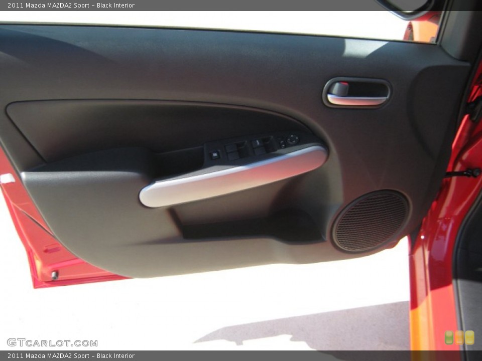 Black Interior Door Panel for the 2011 Mazda MAZDA2 Sport #51839689
