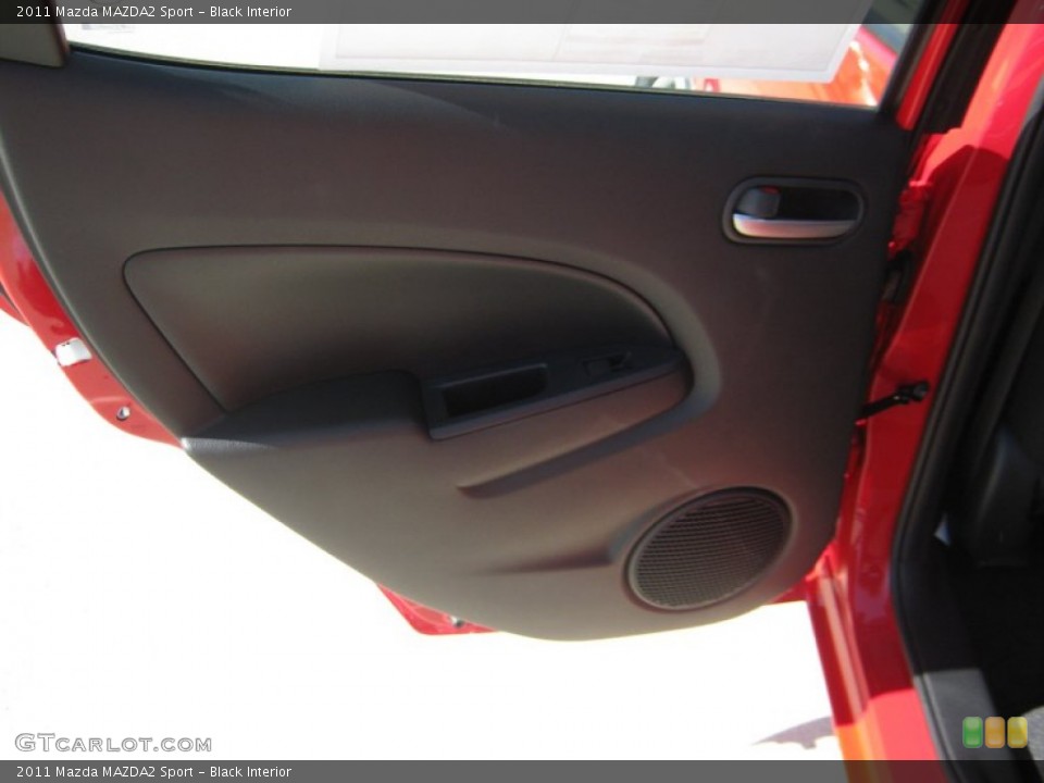 Black Interior Door Panel for the 2011 Mazda MAZDA2 Sport #51839704