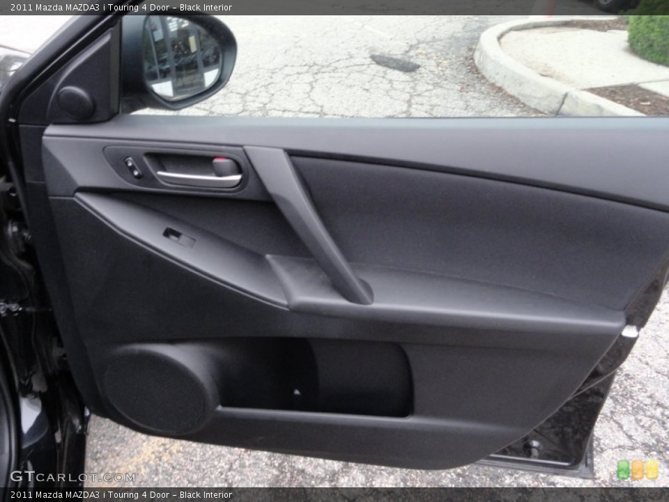 Black Interior Door Panel for the 2011 Mazda MAZDA3 i Touring 4 Door #51866998