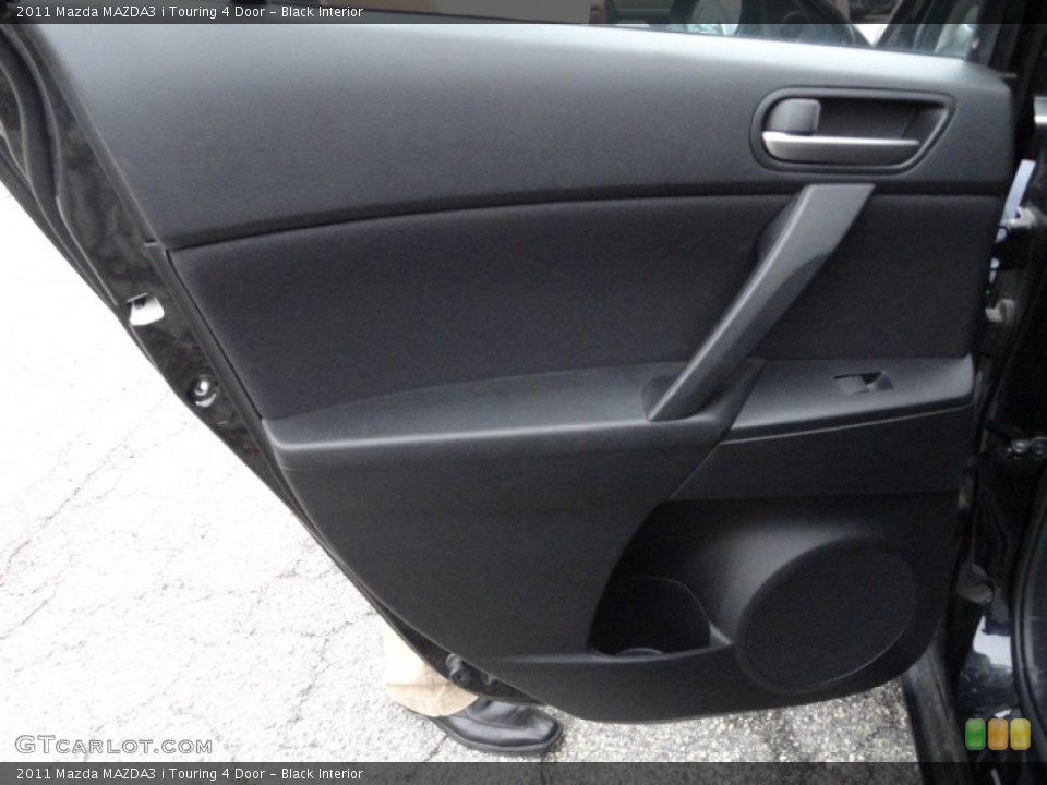 Black Interior Door Panel for the 2011 Mazda MAZDA3 i Touring 4 Door #51867076