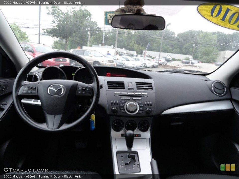 Black Interior Dashboard for the 2011 Mazda MAZDA3 i Touring 4 Door #51867154