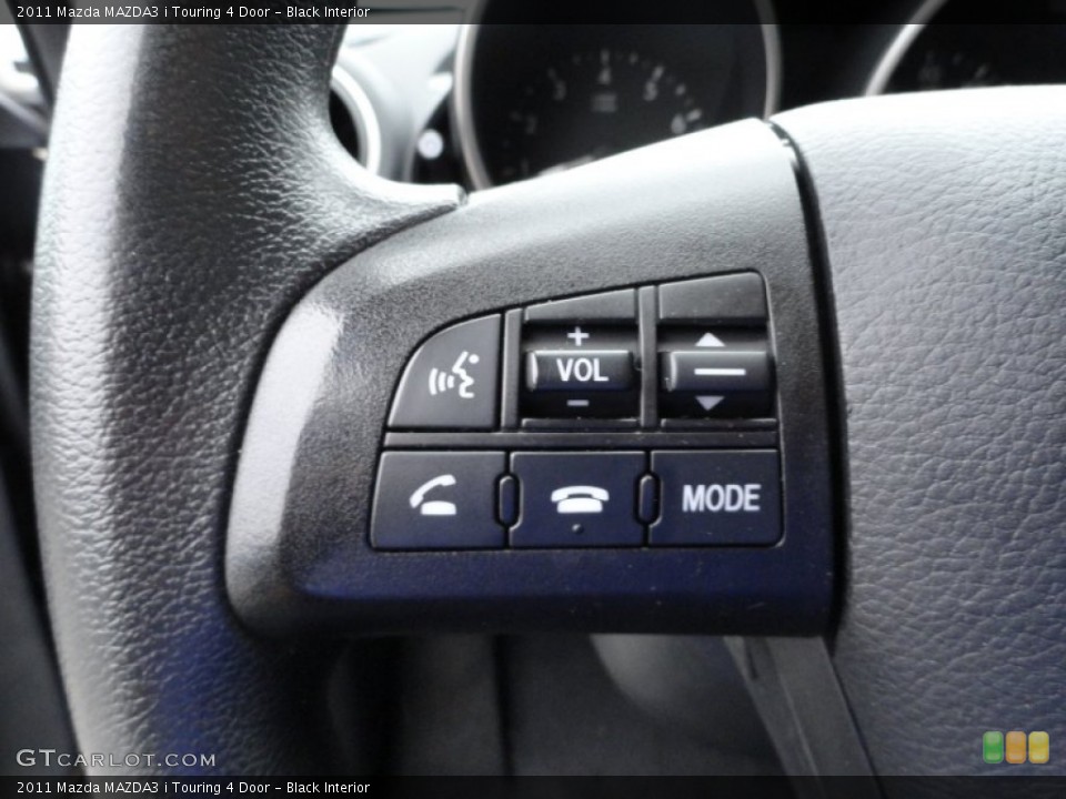 Black Interior Controls for the 2011 Mazda MAZDA3 i Touring 4 Door #51867184