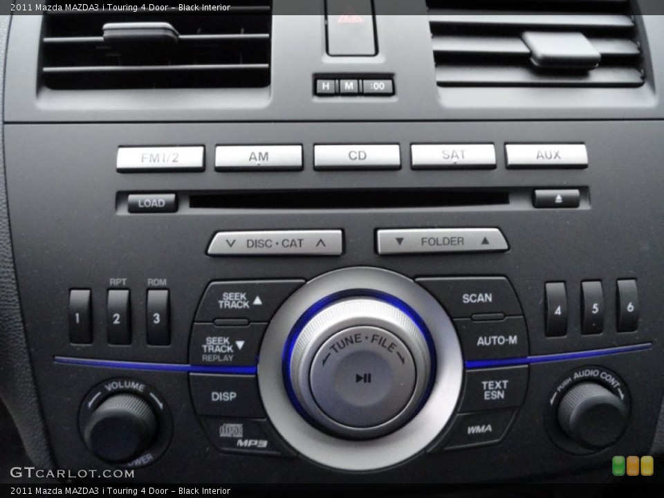 Black Interior Controls for the 2011 Mazda MAZDA3 i Touring 4 Door #51867274