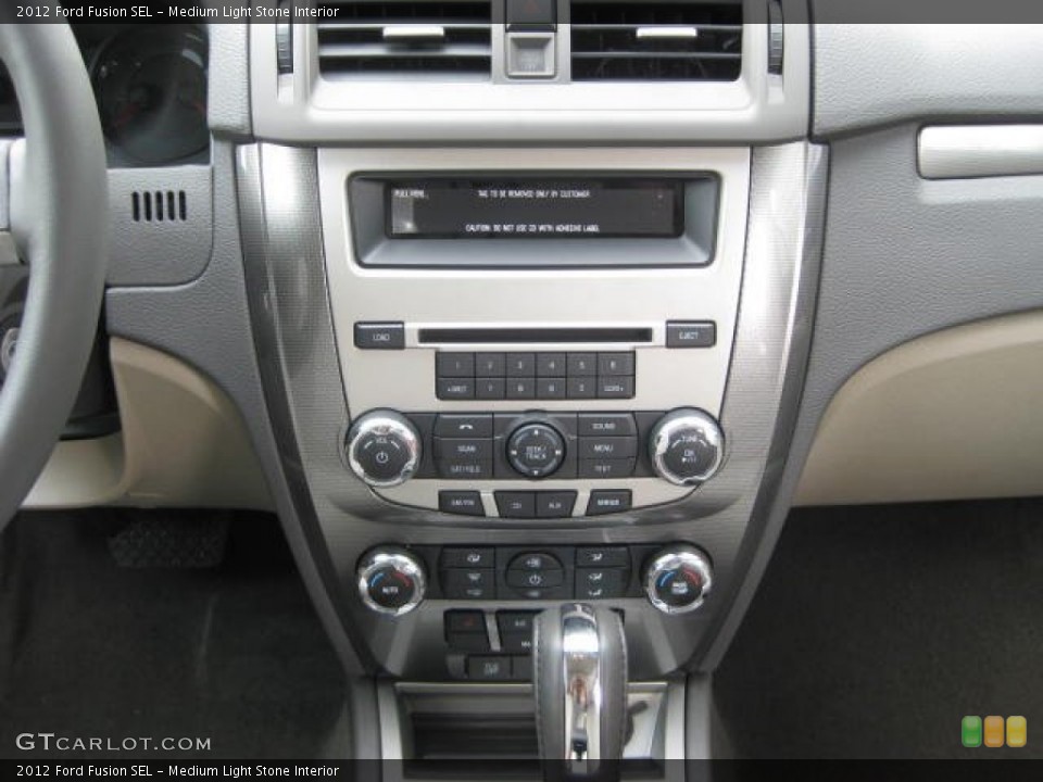 Medium Light Stone Interior Controls for the 2012 Ford Fusion SEL #51873496