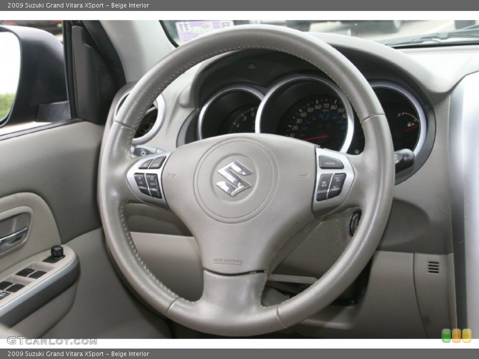 Beige Interior Steering Wheel for the 2009 Suzuki Grand Vitara XSport #51881846