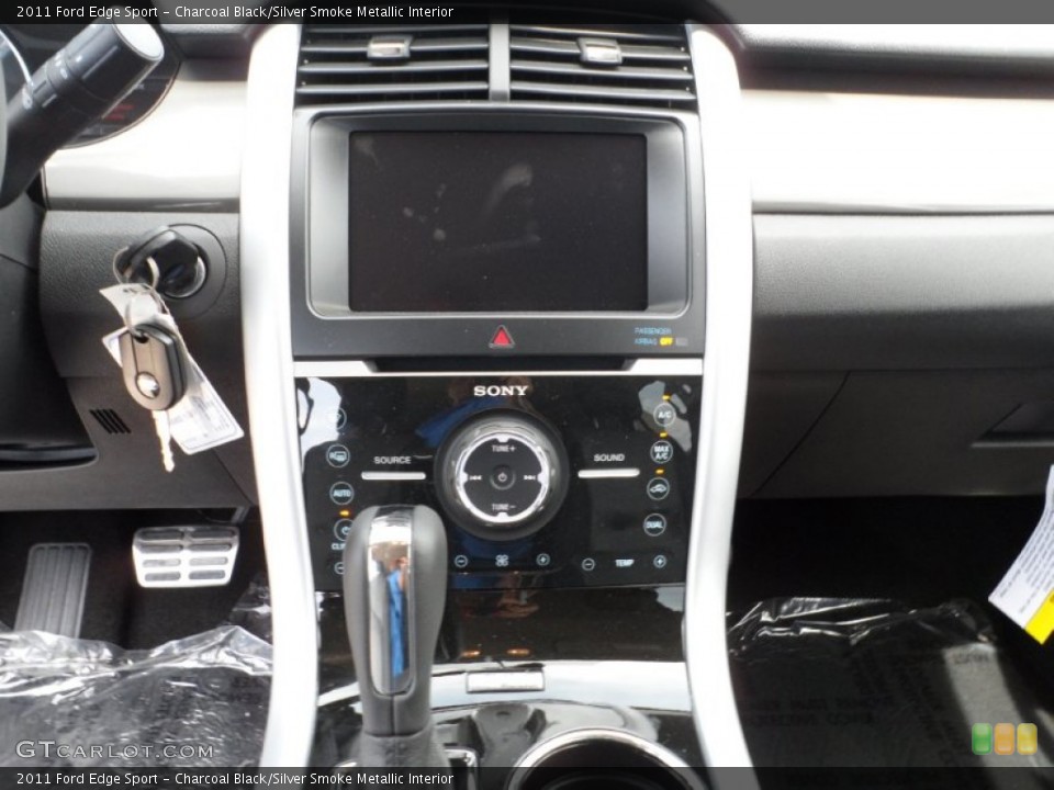 Charcoal Black/Silver Smoke Metallic Interior Controls for the 2011 Ford Edge Sport #51894107
