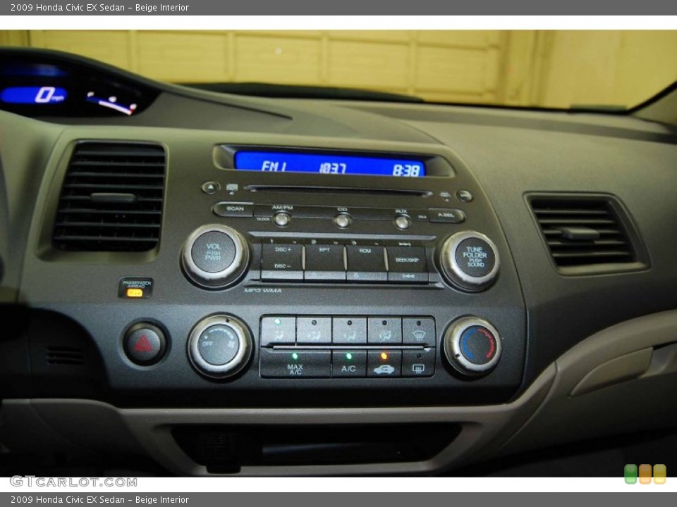 Beige Interior Controls for the 2009 Honda Civic EX Sedan #51904160