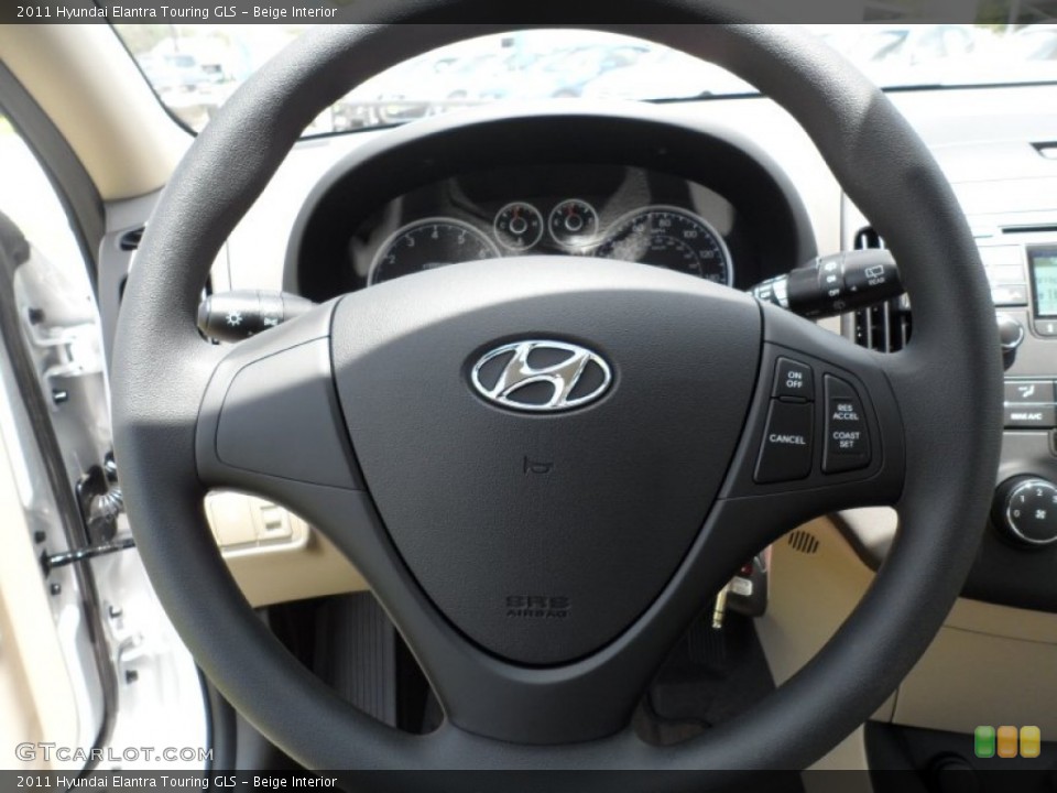 Beige Interior Steering Wheel for the 2011 Hyundai Elantra Touring GLS #51948287