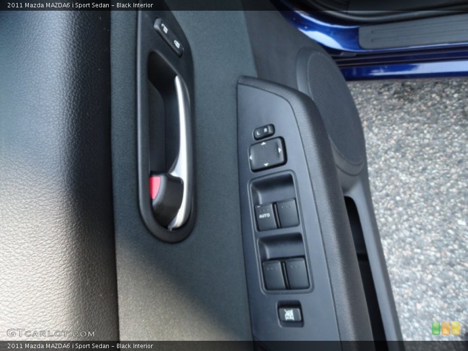 Black Interior Controls for the 2011 Mazda MAZDA6 i Sport Sedan #51979994