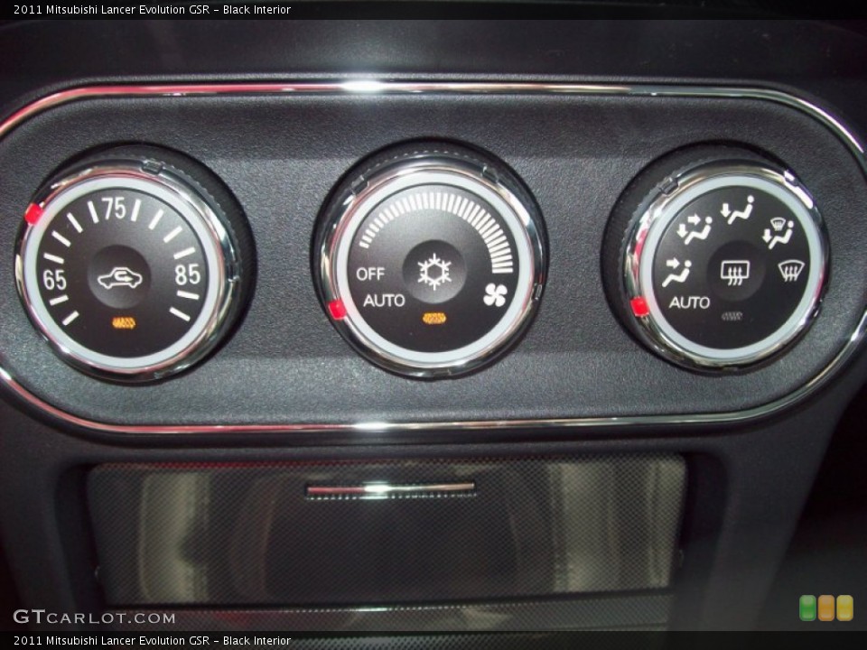 Black Interior Controls for the 2011 Mitsubishi Lancer Evolution GSR #51986459