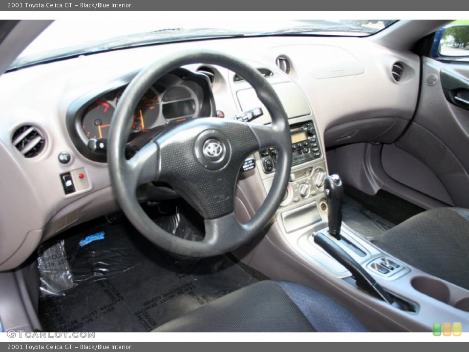 Black/Blue Interior Prime Interior for the 2001 Toyota Celica GT #52007028