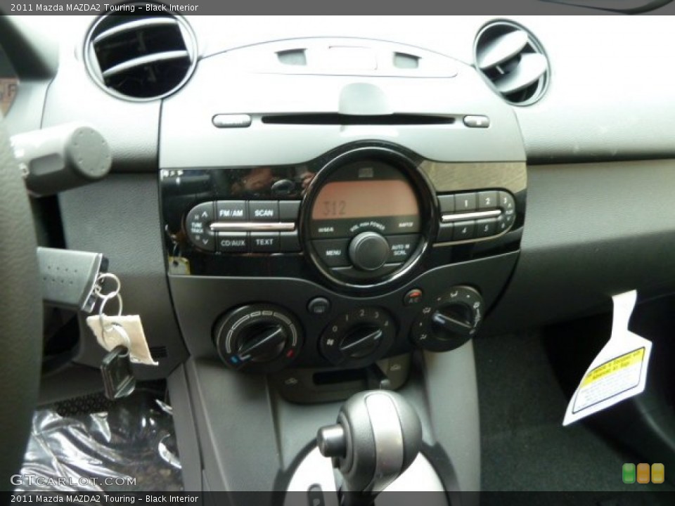 Black Interior Controls for the 2011 Mazda MAZDA2 Touring #52014372