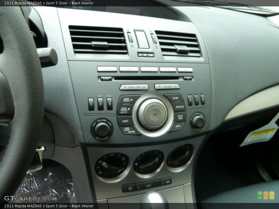 Black Interior Controls for the 2011 Mazda MAZDA3 s Sport 5 Door #52016370